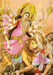 The Goddess Durga slays the demon while riding a tiger
