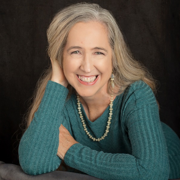 Photo of Susanna with folded arms